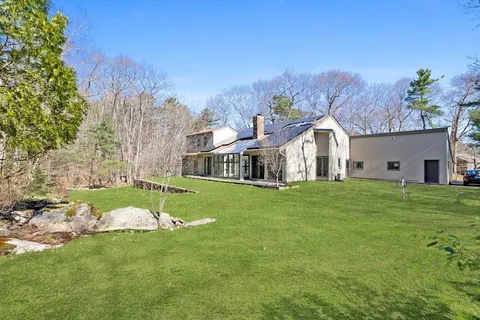 a view of a house with a big yard