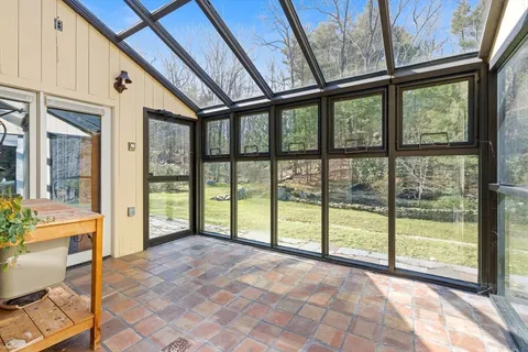 a view of an room with a large window