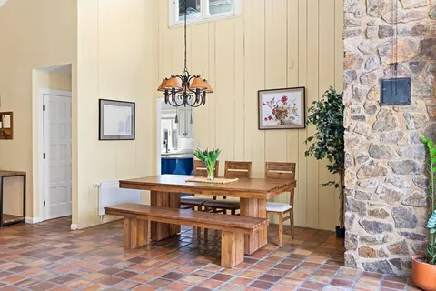 a view of a workspace with furniture