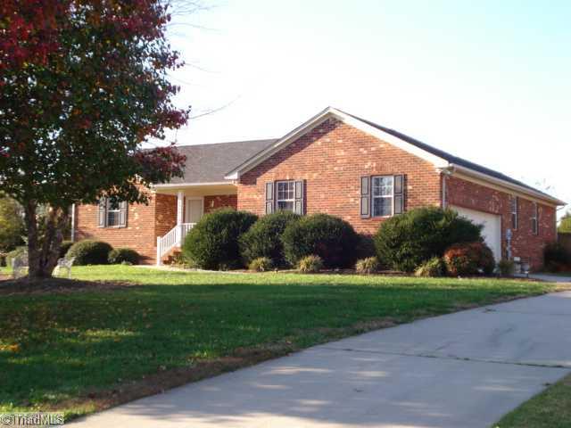 8996 Pepper Ridge Court Oak Ridge, NC 27310 - Photo 2 of 16 Exterior Front.