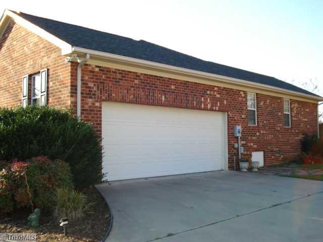 8996 Pepper Ridge Court Oak Ridge, NC 27310 - Photo 3 of 16 Parking Lot/Garage.