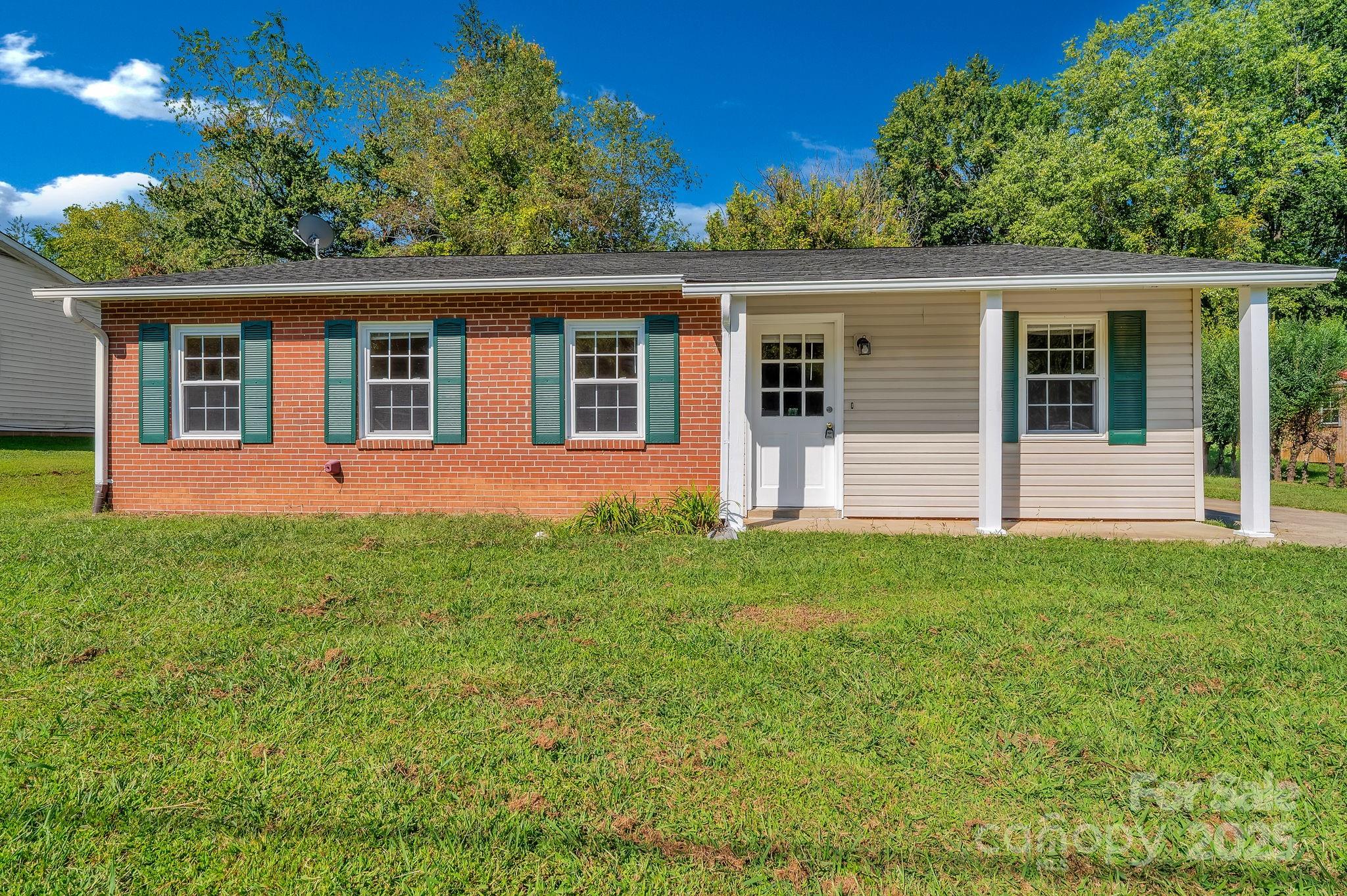 88 Lees Creek Road Asheville, NC 28806 - Photo 1 of 17 front view of a house with a yard