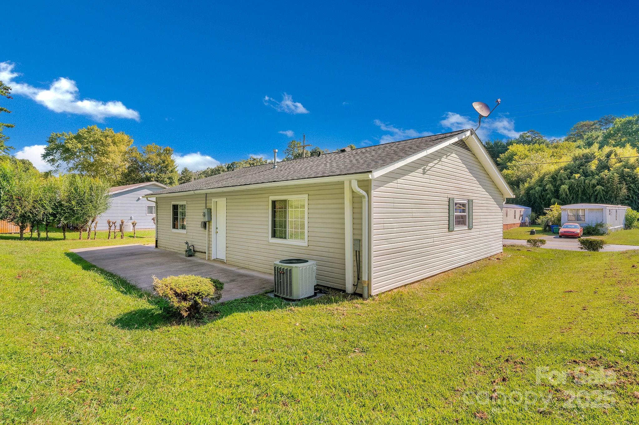 88 Lees Creek Road Asheville, NC 28806 - Photo 17 of 17 a view of a house with pool and chairs