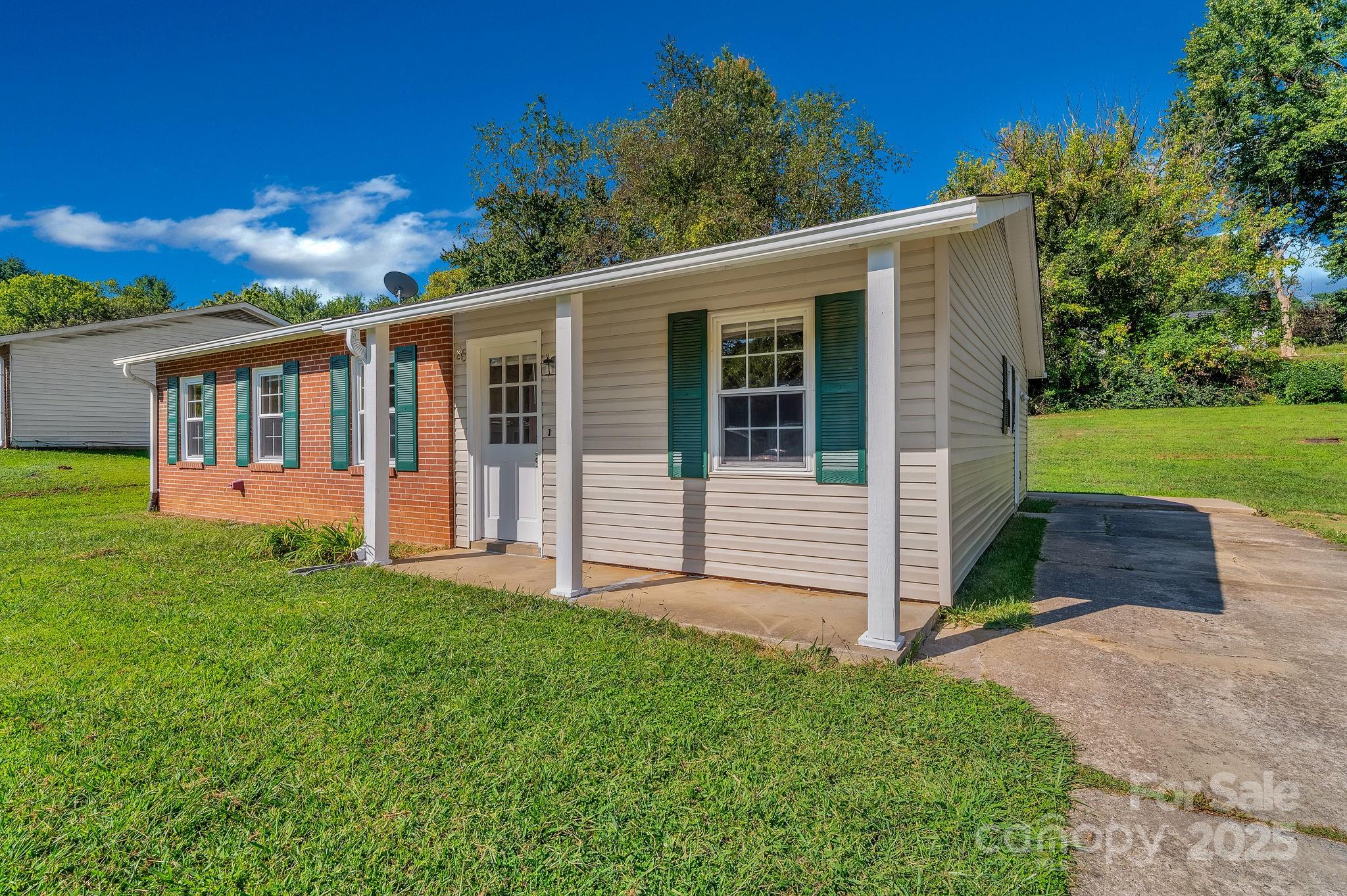 88 Lees Creek Road Asheville, NC 28806 - Photo 2 of 17 a view of a house with backyard and porch