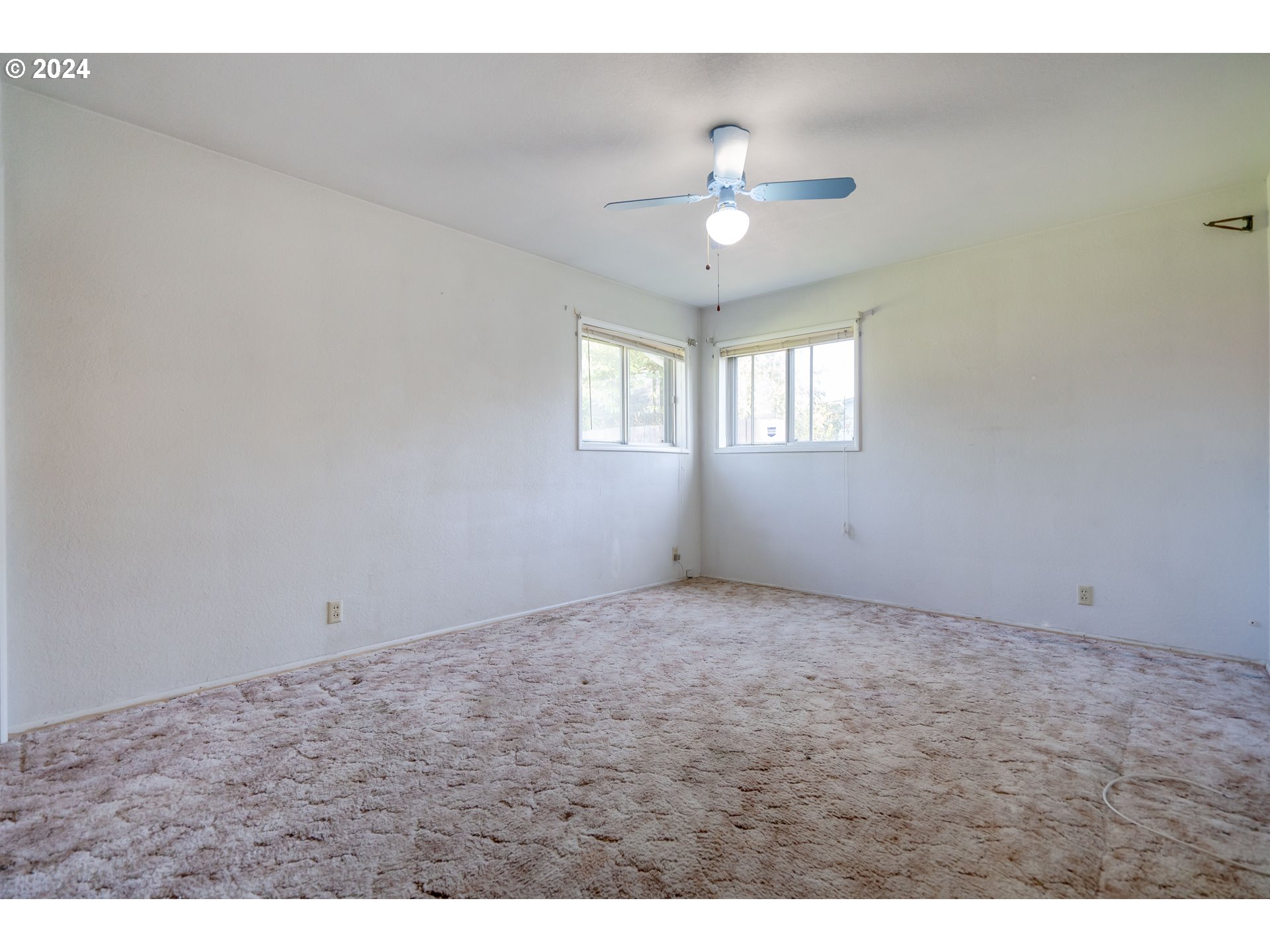 944 Filbert Lane Springfield, OR 97478 - Photo 17 of 24 a view of an empty room with a window