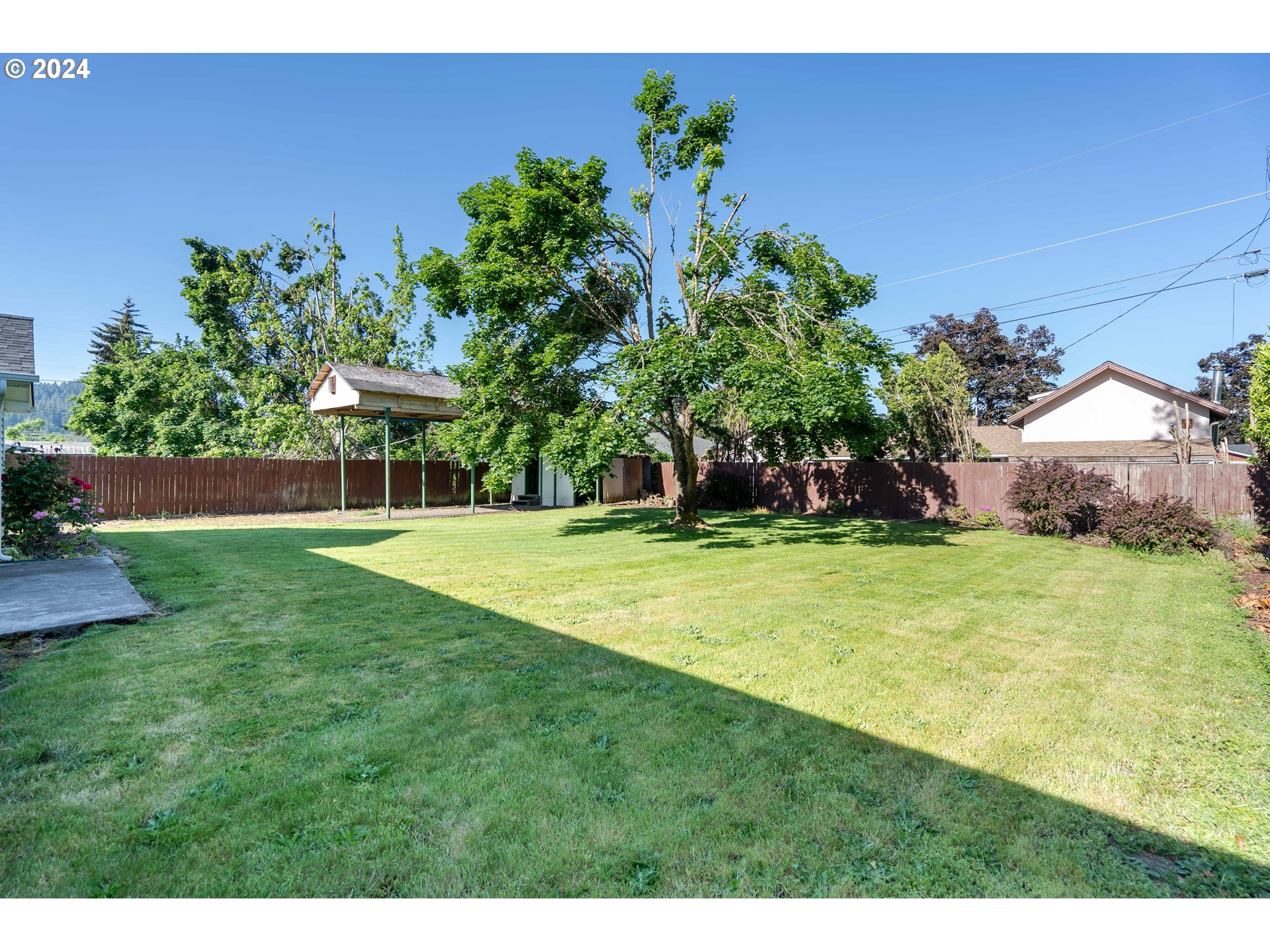 944 Filbert Lane Springfield, OR 97478 - Photo 22 of 24 a view of a house with a backyard