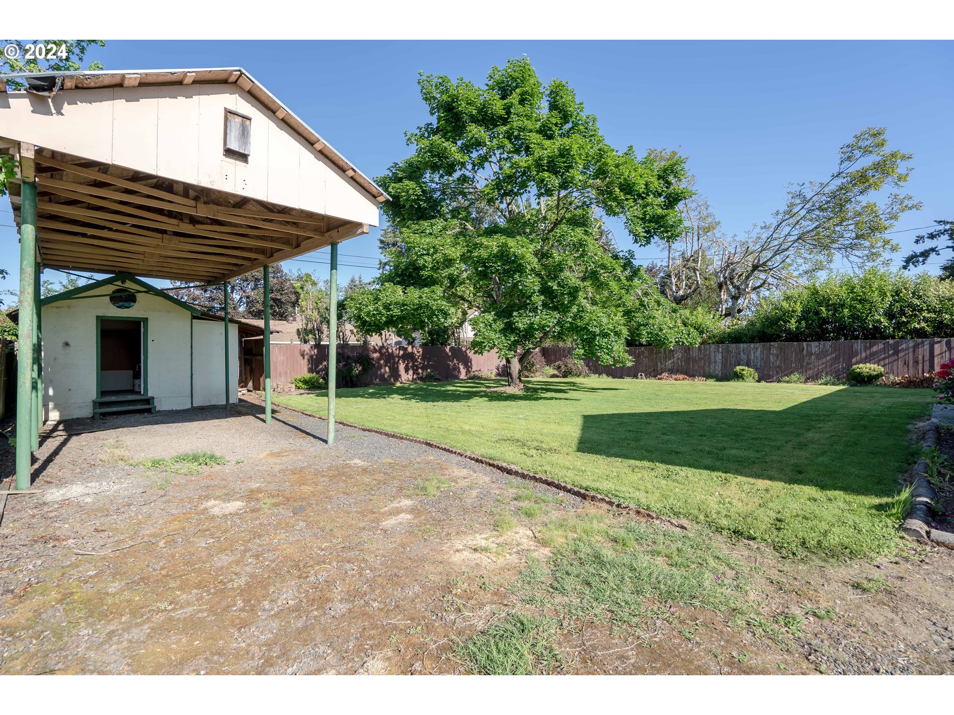 944 Filbert Lane Springfield, OR 97478 - Photo 23 of 24 a view of a backyard with a garden