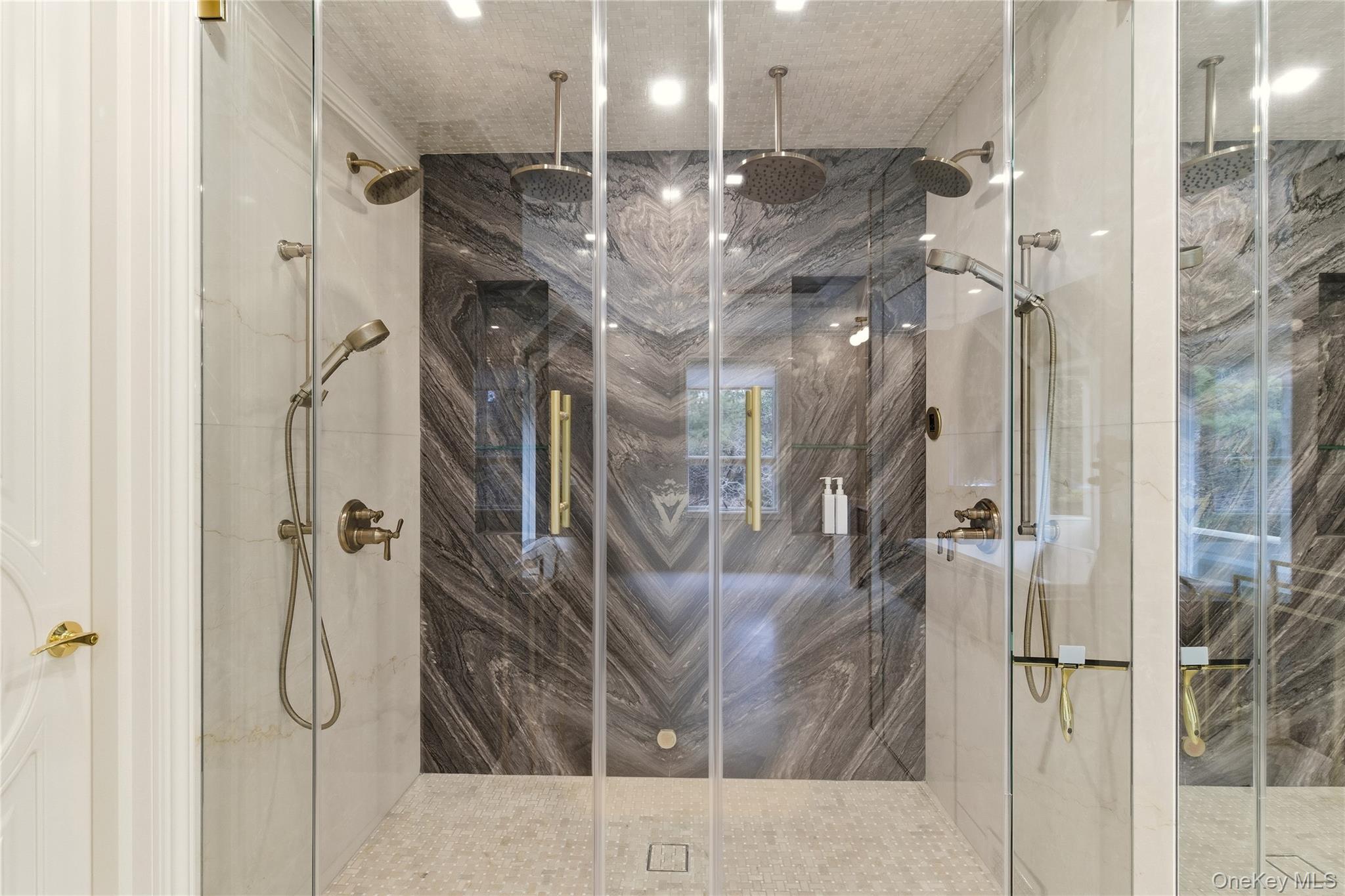 55 Coves Run Syosset, NY 11791 - Photo 29 of 50 a bathroom with a shower