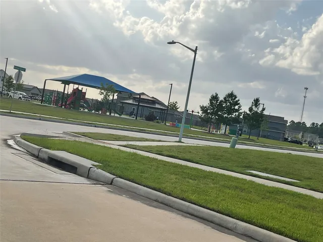 a view of a golf course with a lake