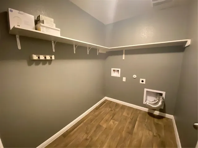 a view of a room with racks on the wall