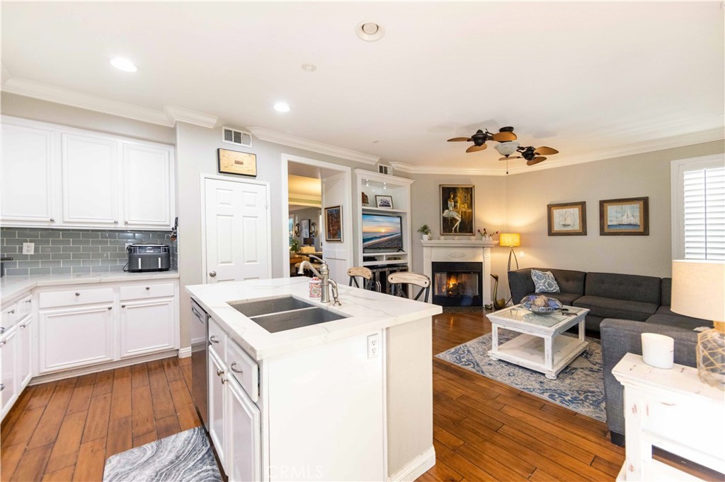 40232 Pasadena Drive Temecula, CA 92591 - Photo 13 of 44 a living room with furniture and fireplace