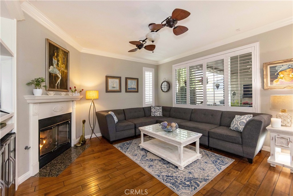 40232 Pasadena Drive Temecula, CA 92591 - Photo 15 of 44 a living room with furniture and a fireplace