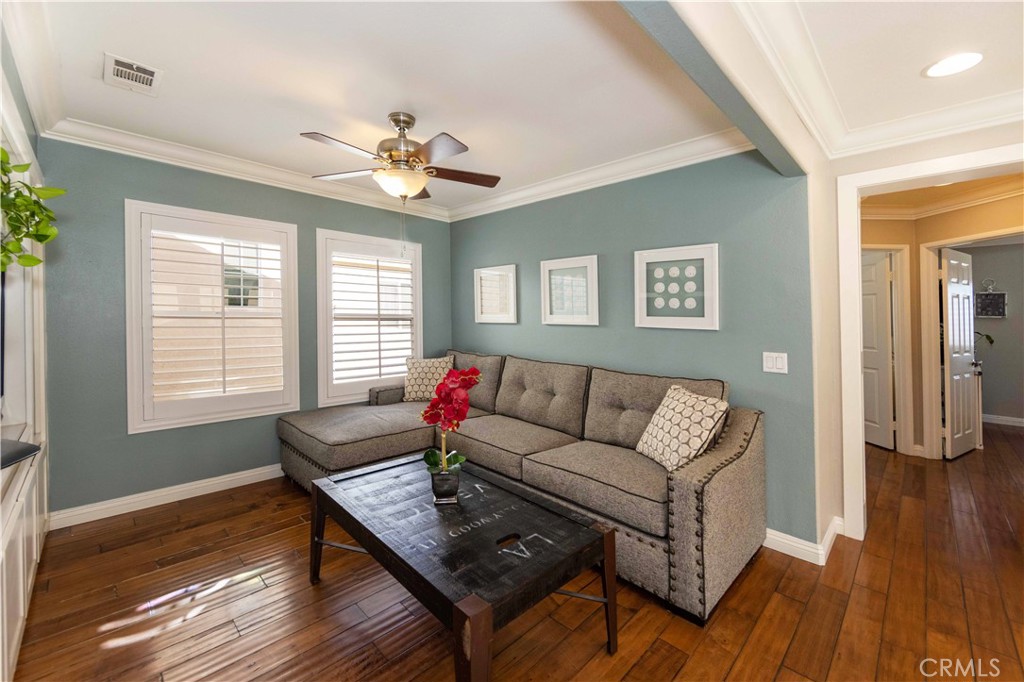 40232 Pasadena Drive Temecula, CA 92591 - Photo 27 of 44 a living room with furniture and wooden floor