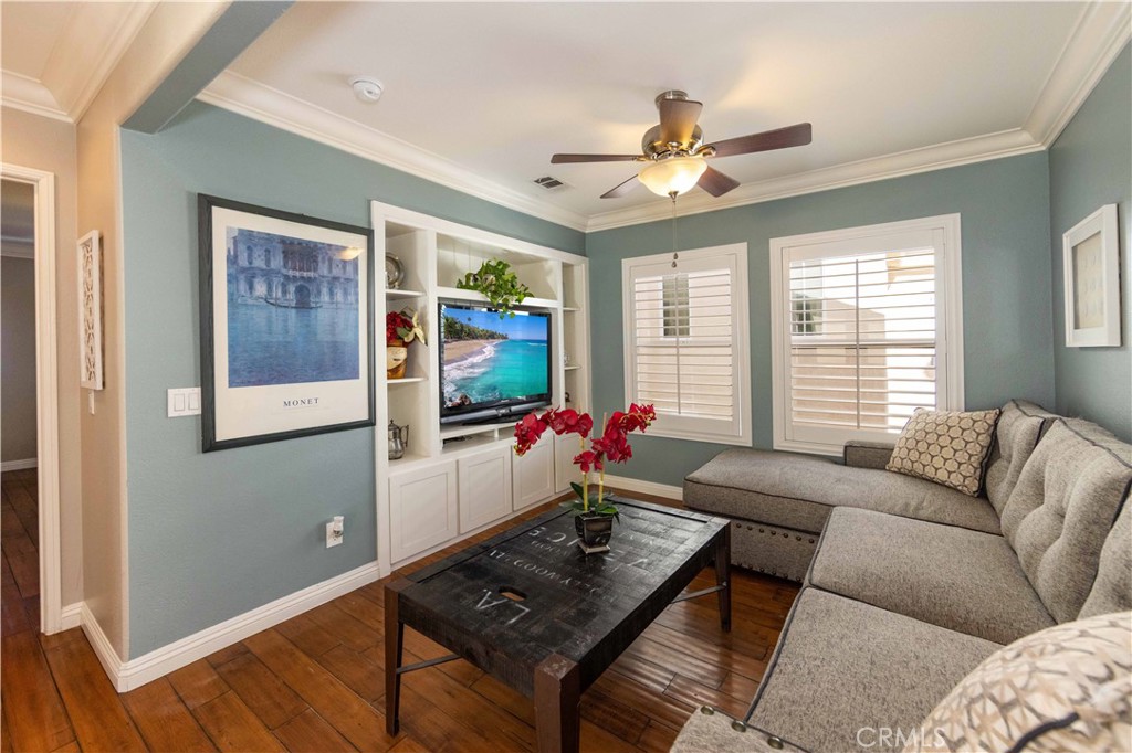 40232 Pasadena Drive Temecula, CA 92591 - Photo 28 of 44 a living room with furniture and a large window