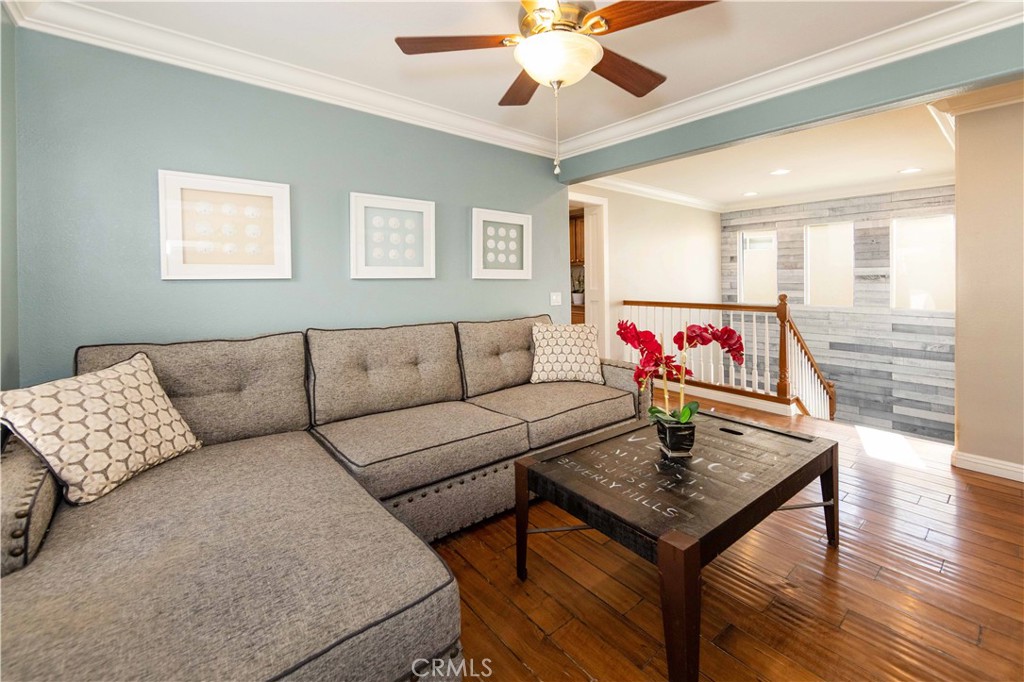 40232 Pasadena Drive Temecula, CA 92591 - Photo 29 of 44 a living room with furniture and a flat screen tv