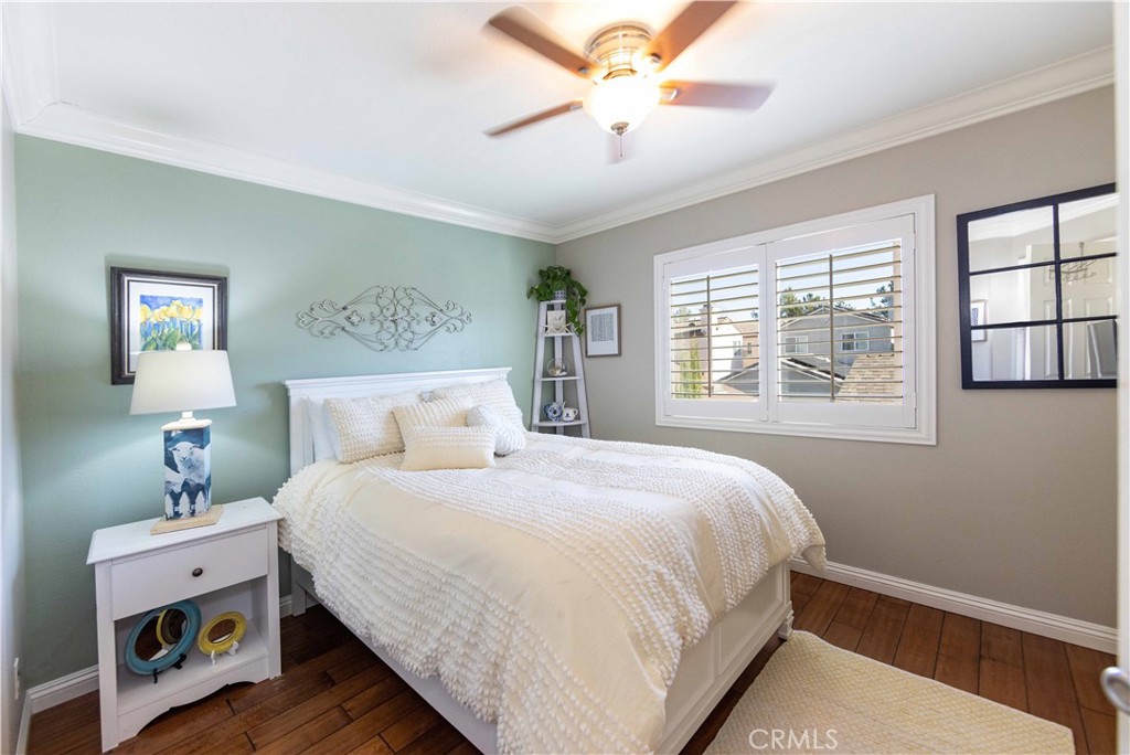 40232 Pasadena Drive Temecula, CA 92591 - Photo 34 of 44 a bedroom with a bed and a window