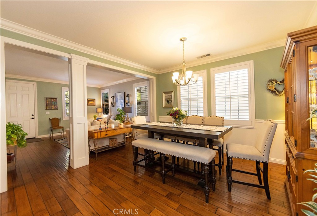 40232 Pasadena Drive Temecula, CA 92591 - Photo 6 of 44 a view of a dining room with furniture window and wooden floor