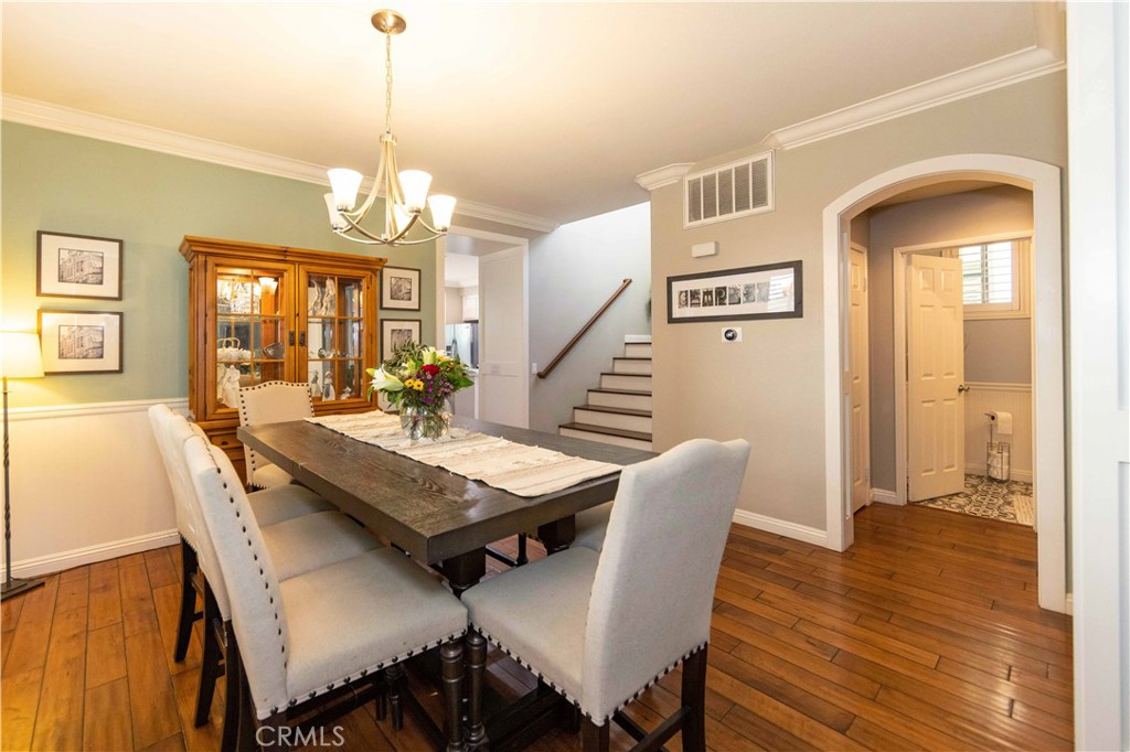 40232 Pasadena Drive Temecula, CA 92591 - Photo 8 of 44 a view of a dining room with furniture window and wooden floor