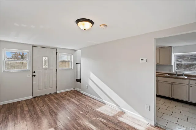 a view of a kitchen from the hallway