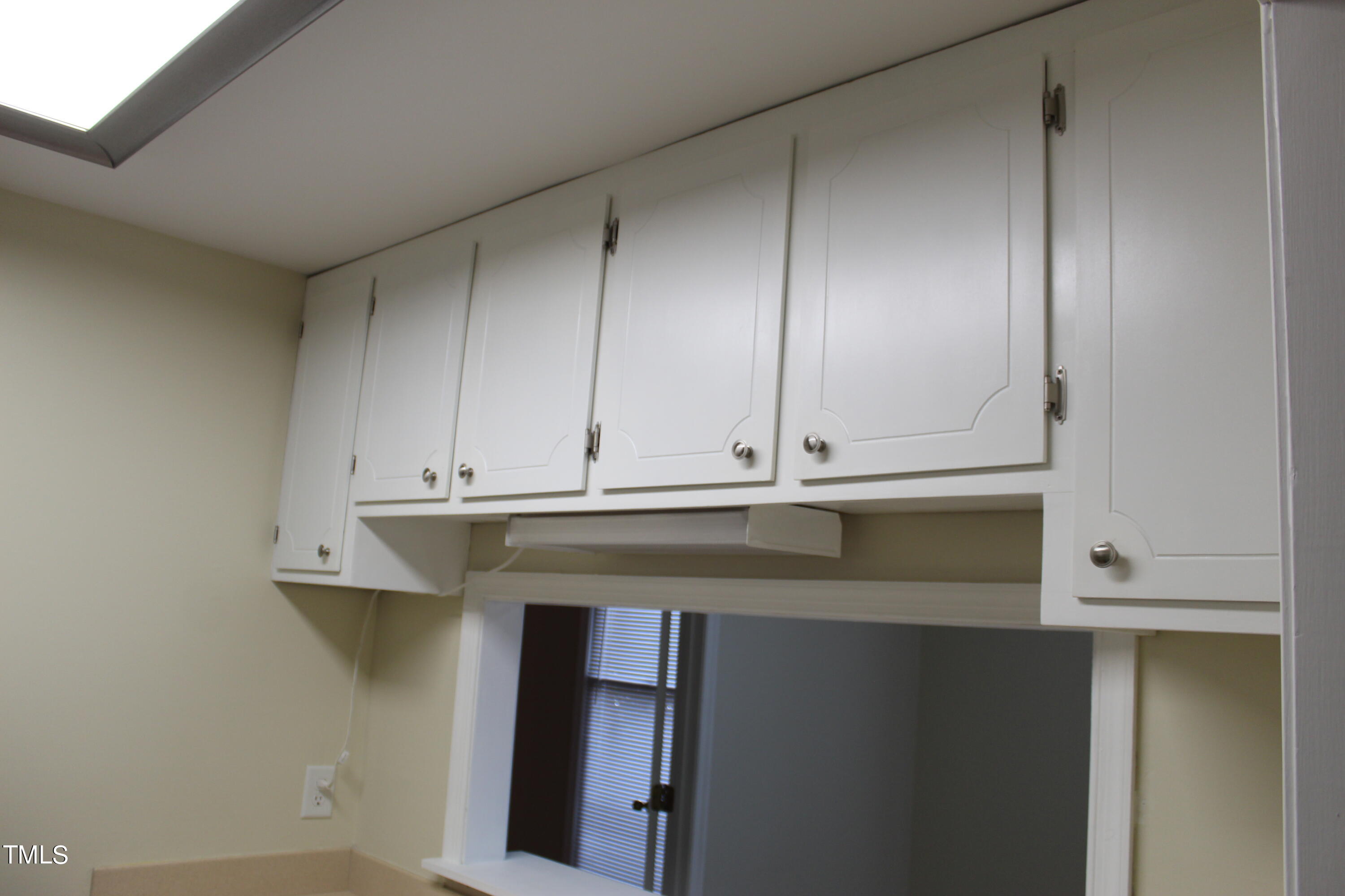 3203 Mill Run, Unit 168 Raleigh, NC 27612 - Photo 44 of 56 a view of room with cabinets