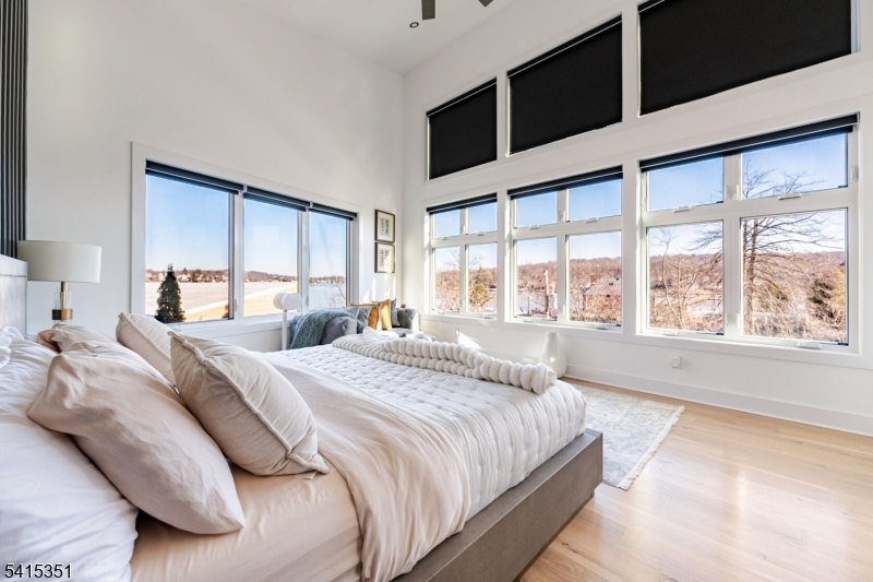 301 Kingsland Road Landing, NJ 07850 - Photo 20 of 42 a bedroom with a large bed and a large window