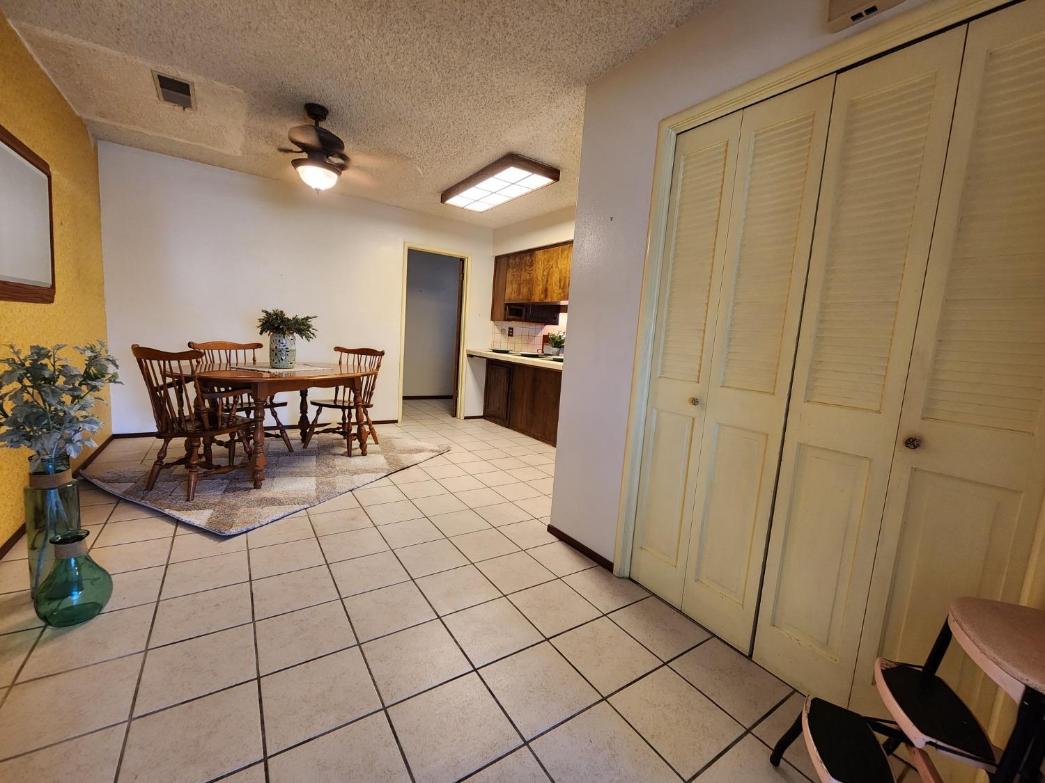 3653 Wright Street Selma, CA 93662 - Photo 18 of 41 a view of a dining room with furniture and chandelier