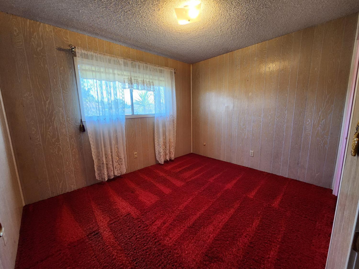 3653 Wright Street Selma, CA 93662 - Photo 29 of 41 a view of empty room with wooden floor
