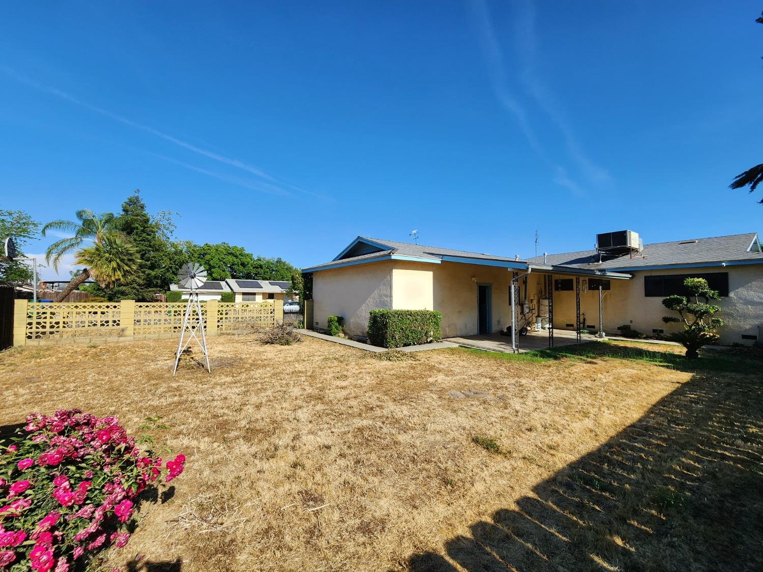 3653 Wright Street Selma, CA 93662 - Photo 40 of 41 a swimming pool with yard in front of it