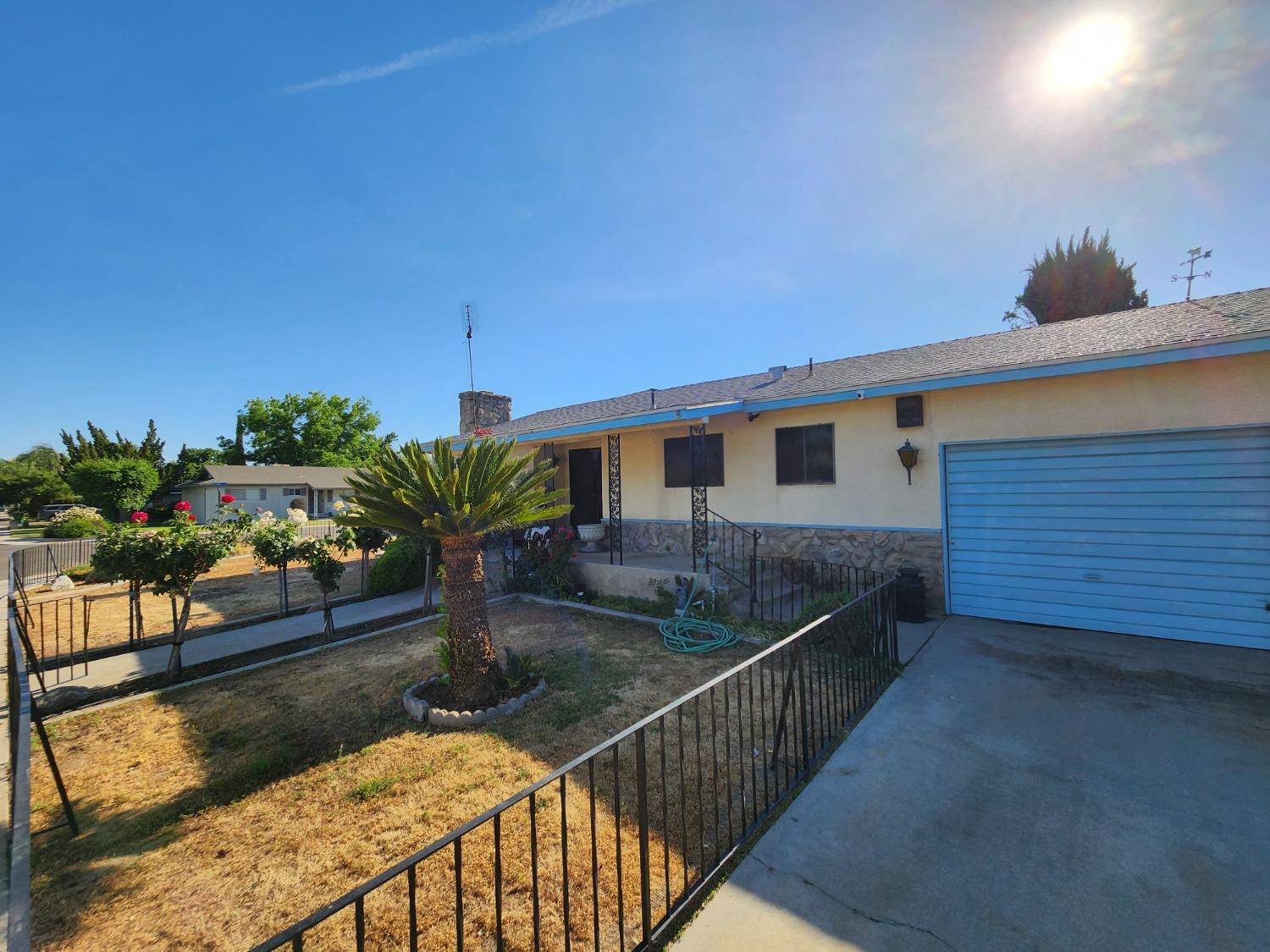 3653 Wright Street Selma, CA 93662 - Photo 7 of 41 a view of a house with backyard and sitting area