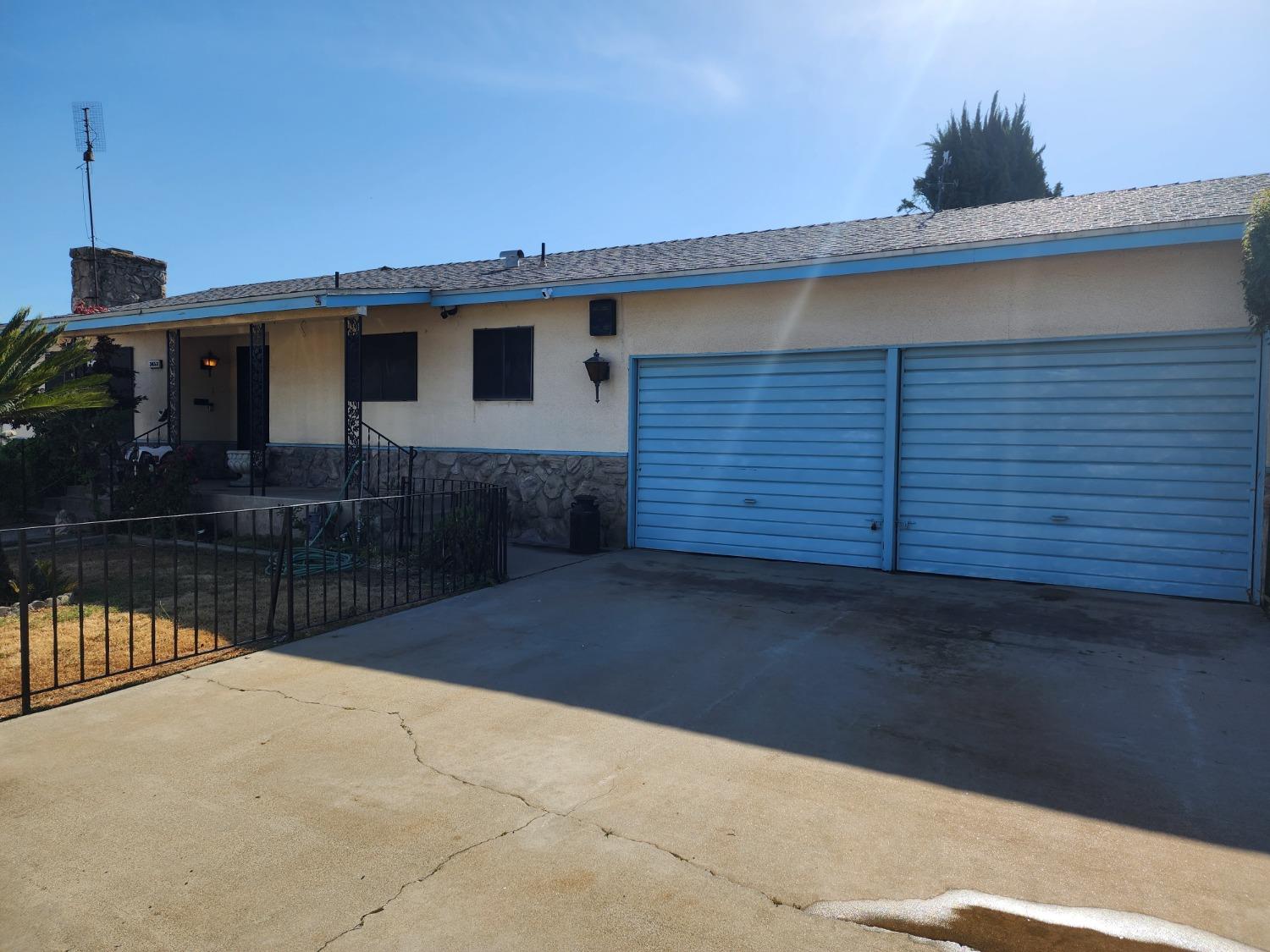 3653 Wright Street Selma, CA 93662 - Photo 8 of 41 a front view of a house with a yard