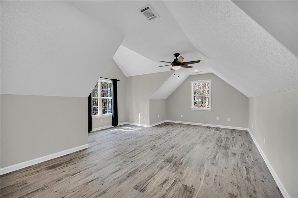 857 Cooper Road Social Circle, GA 30025 - Photo 30 of 88 a view of an empty room and a window