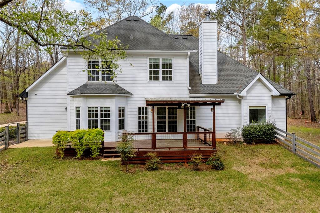 857 Cooper Road Social Circle, GA 30025 - Photo 47 of 88 a view of a house with backyard porch and sitting area