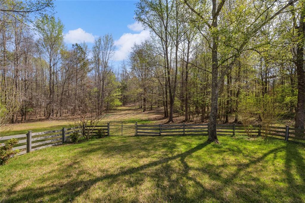 857 Cooper Road Social Circle, GA 30025 - Photo 51 of 88 a view of swimming pool with a yard