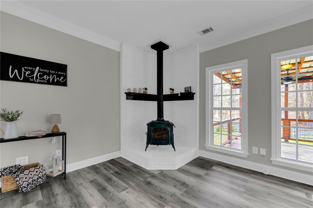 857 Cooper Road Social Circle, GA 30025 - Photo 6 of 88 a room with hard wood floor