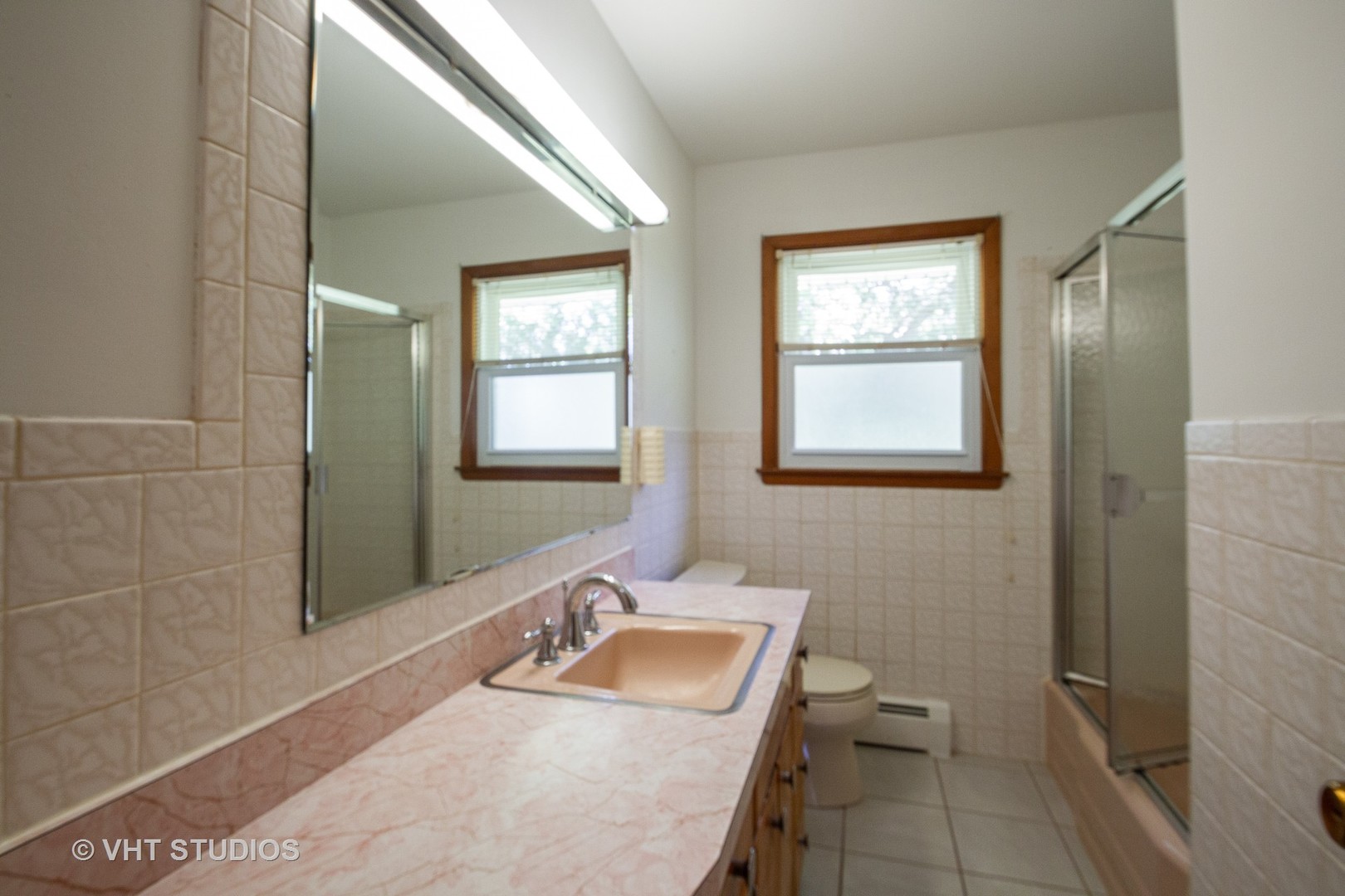 21102 Robin Road Harvard, IL 60033 - Photo 14 of 21 a bathroom with a sink and a mirror