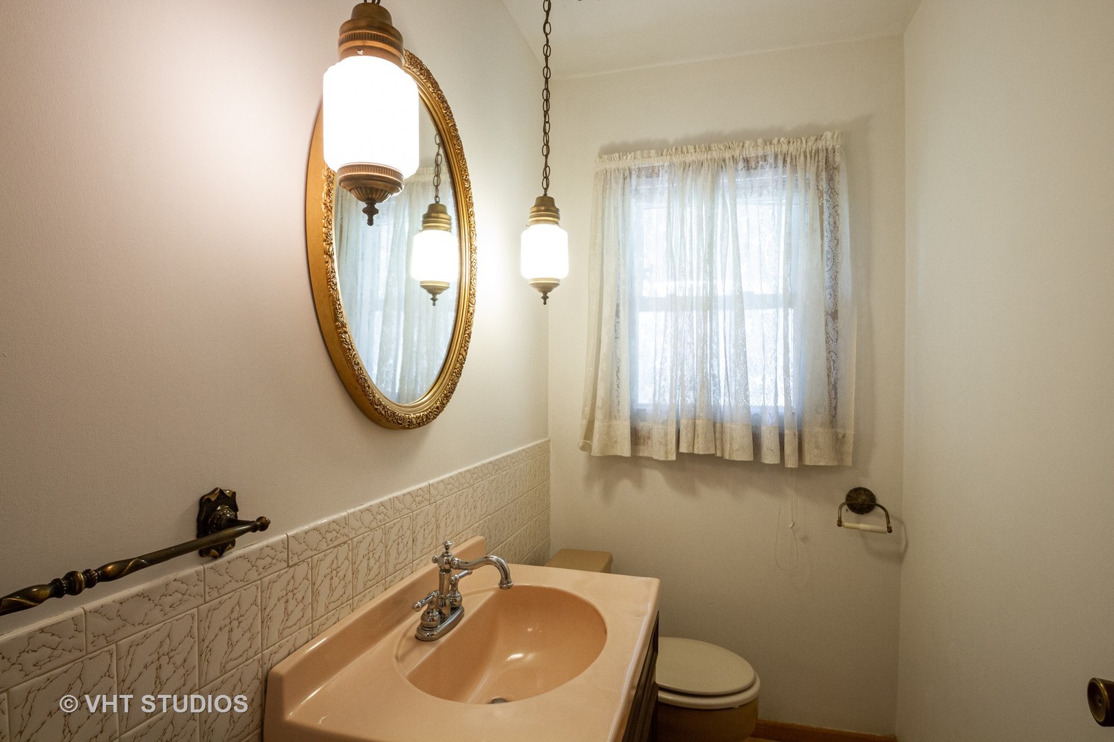 21102 Robin Road Harvard, IL 60033 - Photo 17 of 21 a bathroom with a sink and a mirror