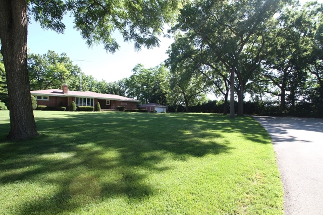 21102 Robin Road Harvard, IL 60033 - Photo 21 of 21 a view of swimming pool with a yard