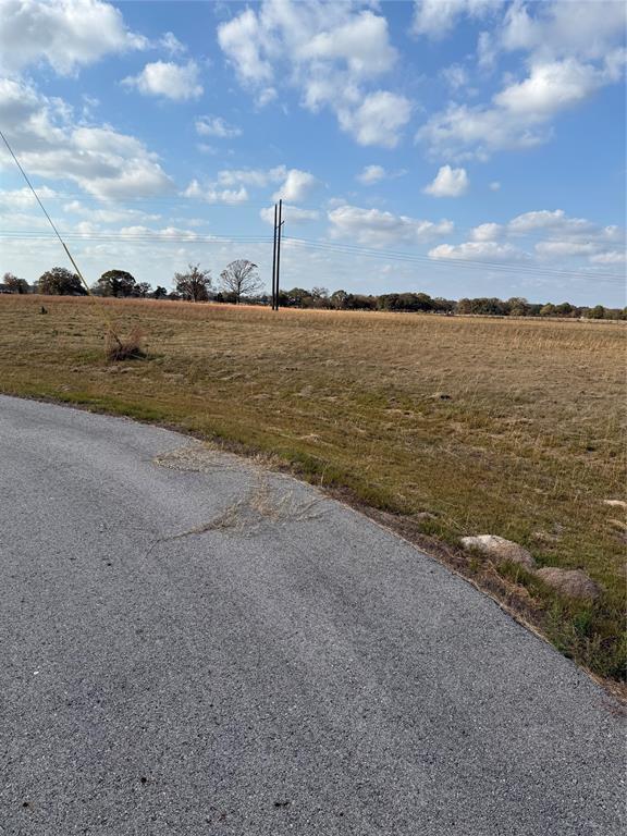 5304 Emory Tx 75440 Emory, TX 75440 - Photo 5 of 19 View of asphalt road featuring a view of countryside