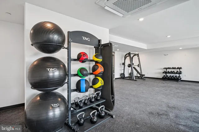 a room with furniture and air hockey table