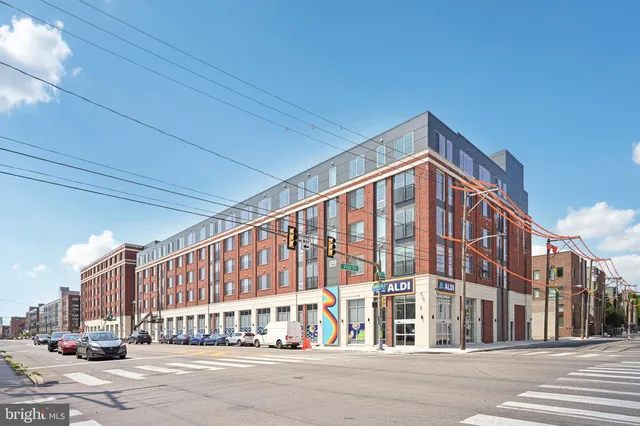 a view of a building with a street