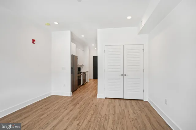 a view of a livingroom with wooden floor
