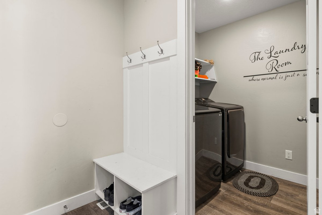 463 South Trejo Ridge Road Grantsville, UT 84029 - Photo 9 of 22 Entryway mudroom with built-in bench and shoe storage, featuring coat hooks and wood-finish flooring