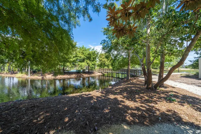 a view of a porch with furniture and a yard