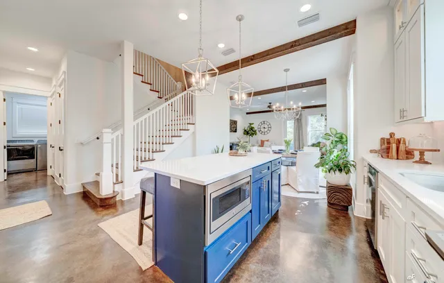 a kitchen with a stove and a sink