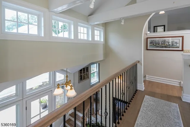 a view of a hallway with windows