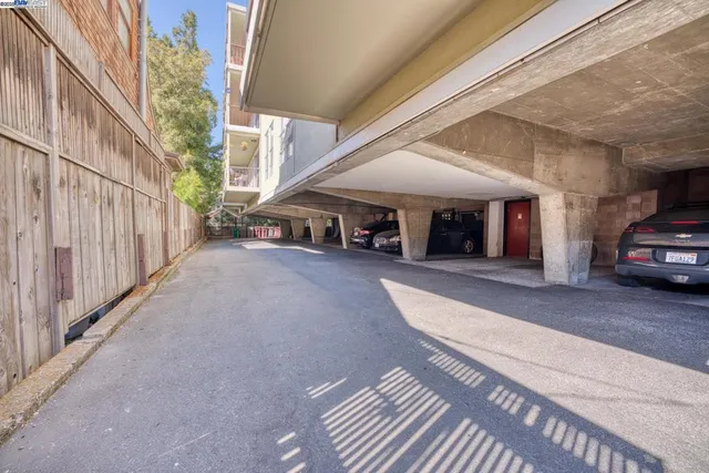 a view of a car park in front of house