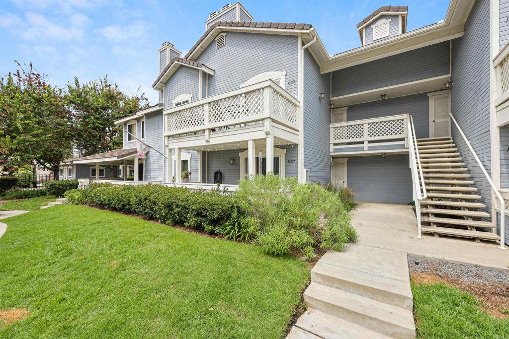 13951 Midland Road Poway, CA 92064 - Photo 1 of 1 a front view of a house with a yard