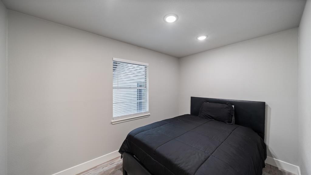129 King Arthur Road Mabank, TX 75156 - Photo 16 of 33 This room features recessed lighting, a window with blinds, and light-colored walls