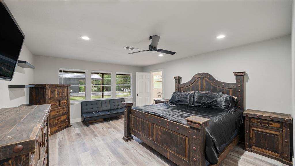 129 King Arthur Road Mabank, TX 75156 - Photo 7 of 33 This room features light-colored flooring, recessed lighting, and a ceiling fan