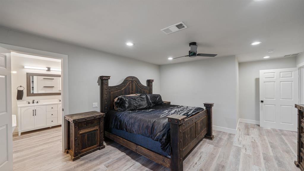 129 King Arthur Road Mabank, TX 75156 - Photo 8 of 33 This bedroom features light-colored flooring, recessed lighting, and a ceiling fan
